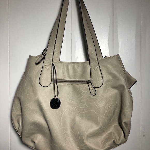 - Womens Light Tan Purse with Bow/Studs. Like New - Picture 4 of 8